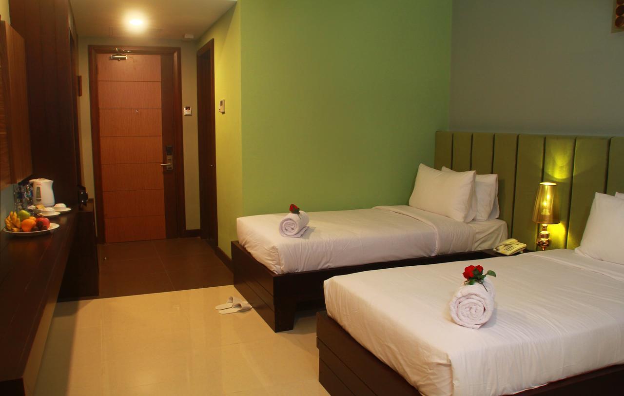 Sutanraja Hotel Kotamobagu Extérieur photo